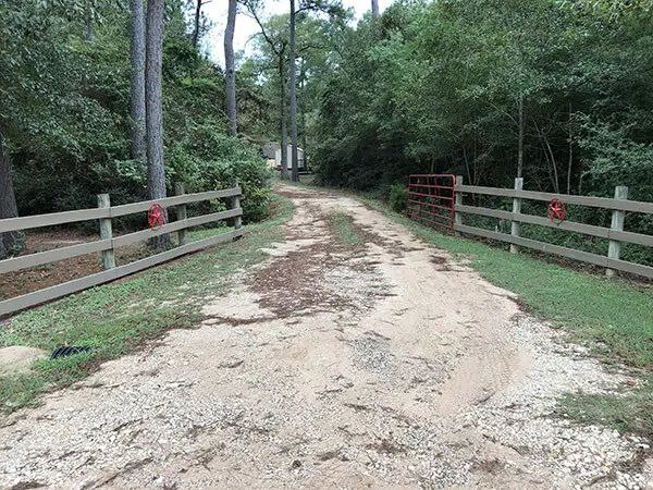 Excavation Services - Gravel Driveway Before Repair